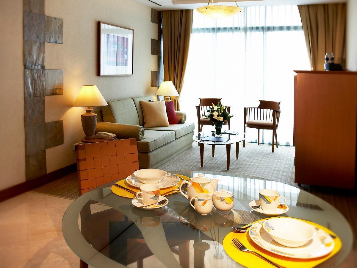 싱가포르 프레이저 플레이스 로버슨 워크 아파트 호텔 외부 사진 A typical living room in a serviced apartment